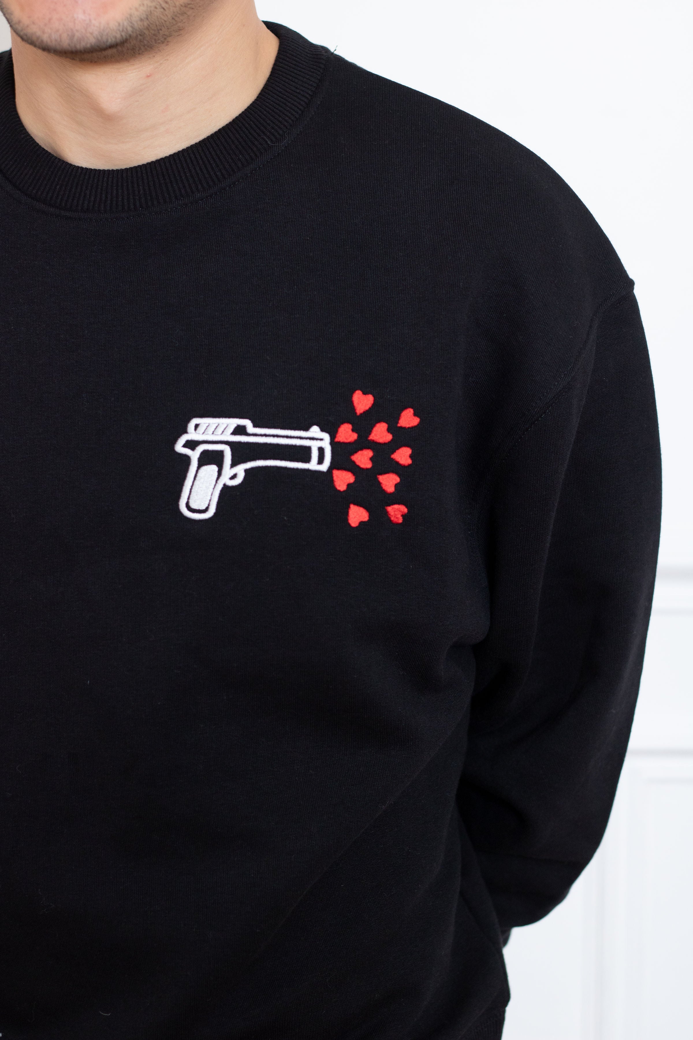 SWEAT NOIR PISTOLET